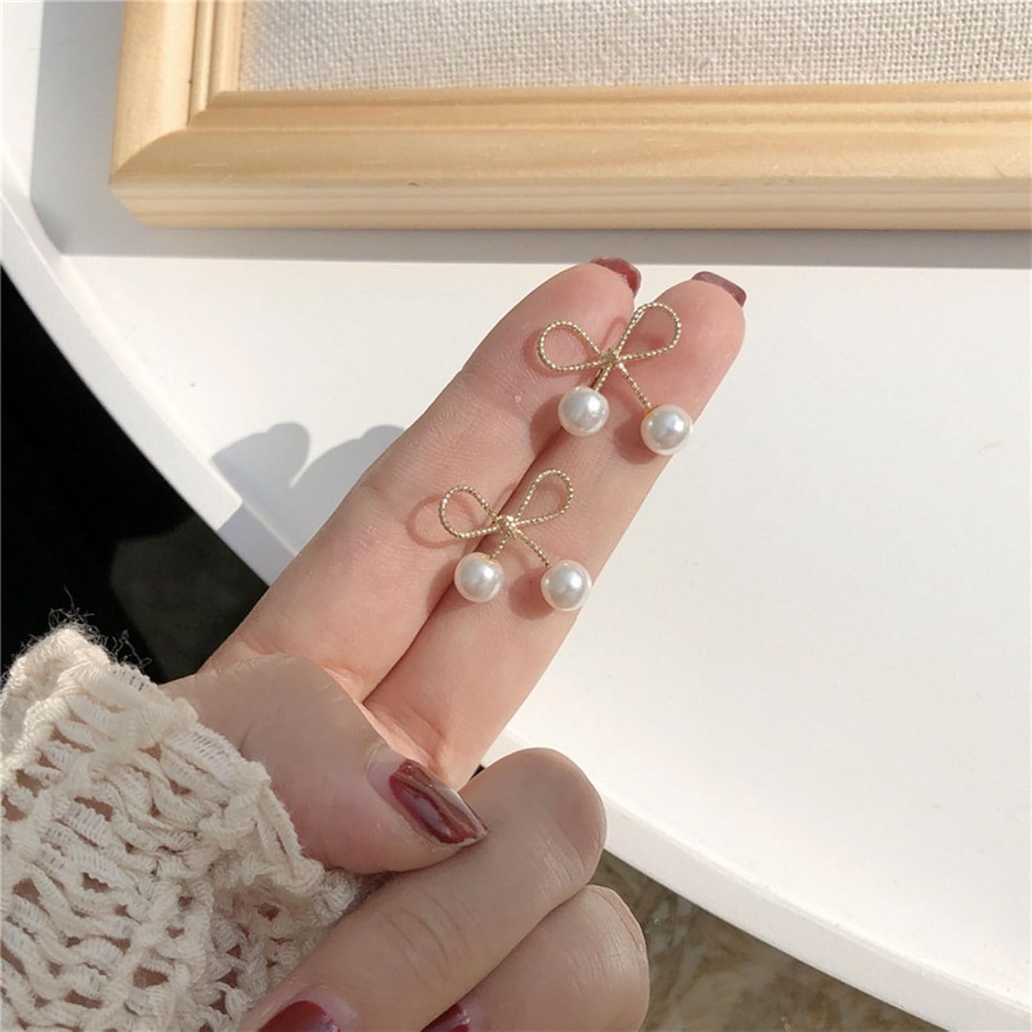 Pearl Bow Elegance Clip-On Earrings